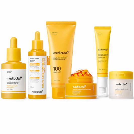 MEDICUBE Kojic Turmeric Dark Spot Care Set with serum, cleanser, pad, peel shot, eye gel, and capsule cream at Glam Secret