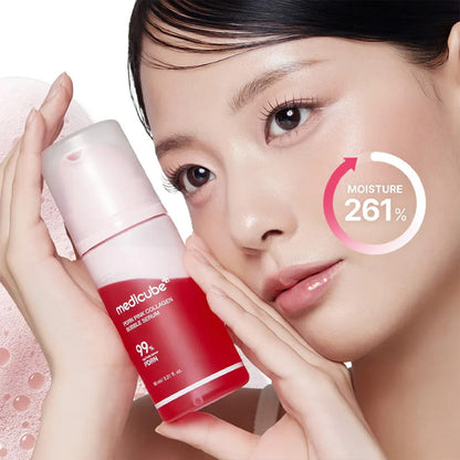 Medicube PDRN Pink Collagen Bubble Serum 95ml in a clear bottle with a pump dispenser, showcasing a pink label and bubbles.